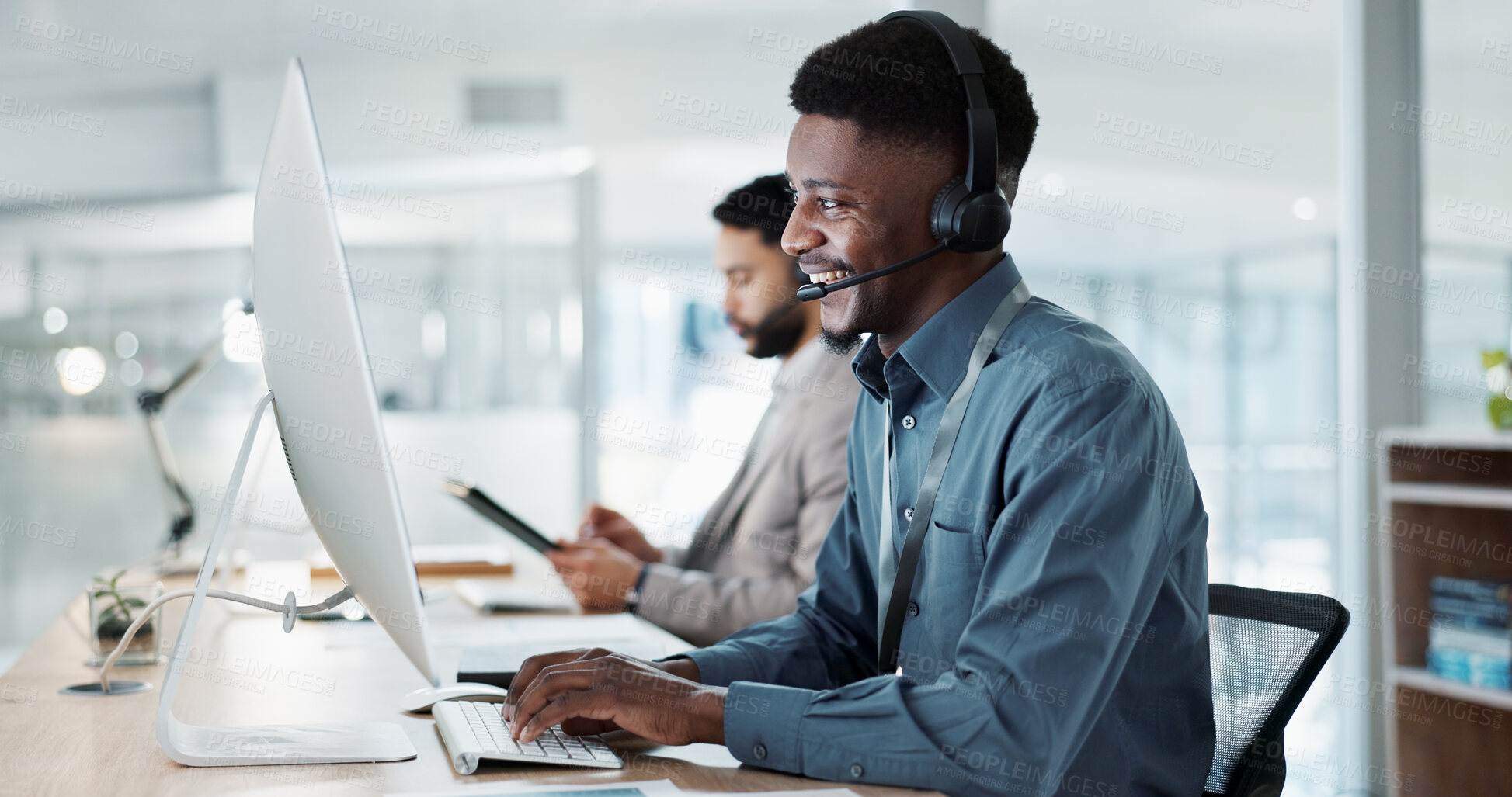 Buy stock photo Happy black man, call center and customer service in telemarketing, communication or support at office. African male person or consultant agent smile in online advice, help or contact us at workplace