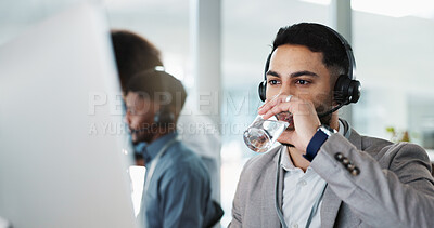 Happy businessman, call center and drinking water in customer service or telemarketing at office. Thirsty man, consultant or agent talking with headphones and drink for online advice, support or help