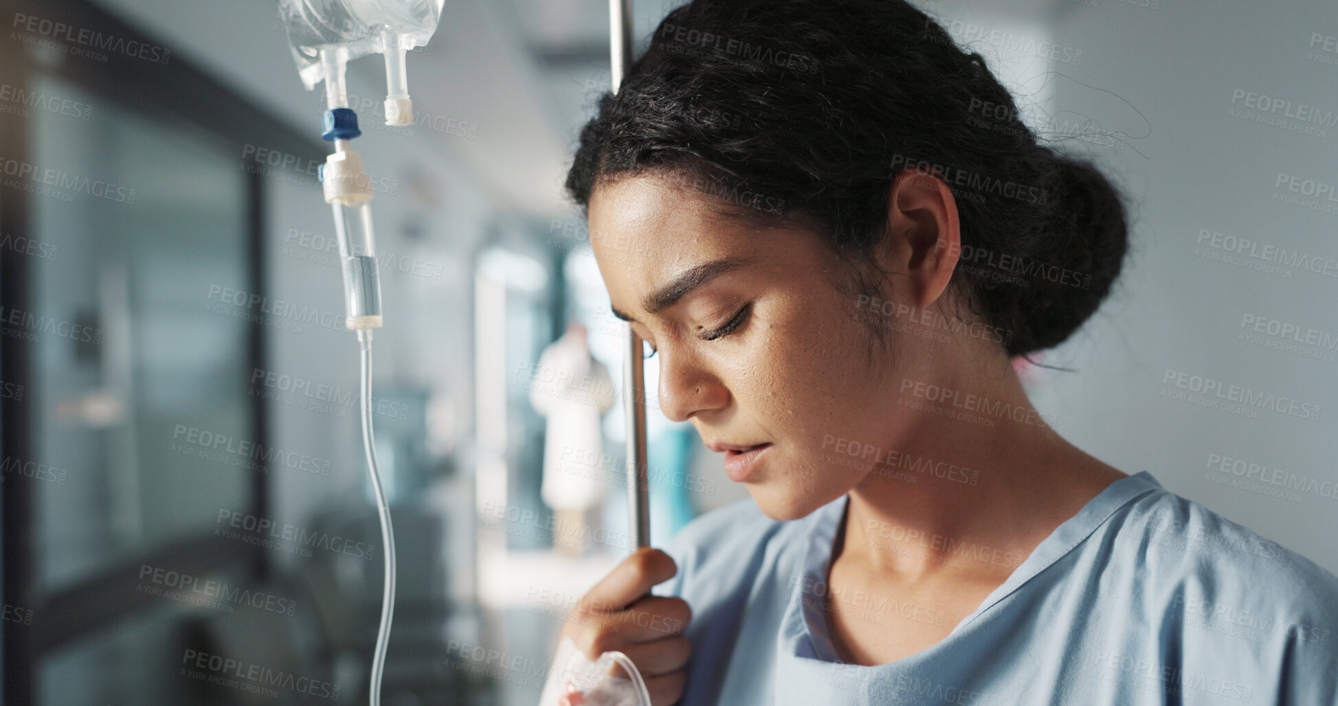 Buy stock photo Sad, breathing and a woman with an iv drip at hospital for medicine, wellness and recovery from virus. Depression, thinking and a clinic patient with treatment stress, burnout or anxiety while sick