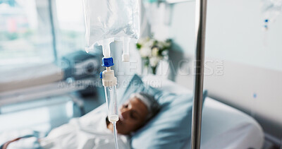 Hospital, IV drip and woman in a clinic bed for surgery or wellness emergency with closeup of liquid. Medical, healthcare and senior female patient with fluid for nutrition and infusion for health