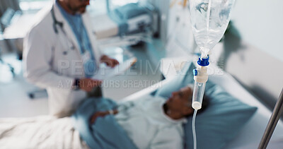 IV drip, healthcare and medicine with doctor and patient in hospital, treatment and surgery with healing. People at clinic, health with medication or liquid in bag for infusion, service and recovery