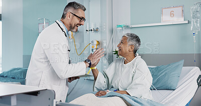 Hospital, doctor and woman high five for success with ventilation tube for oxygen, medical service and care. Healthcare, happy and mature person celebrate for surgery recovery, wellness and healing