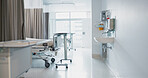 Hospital, modern and interior of bedroom or empty room for healthcare, consulting or healing. Background, medical and clinic space for emergency, rehabilitation or recovery with furniture or light