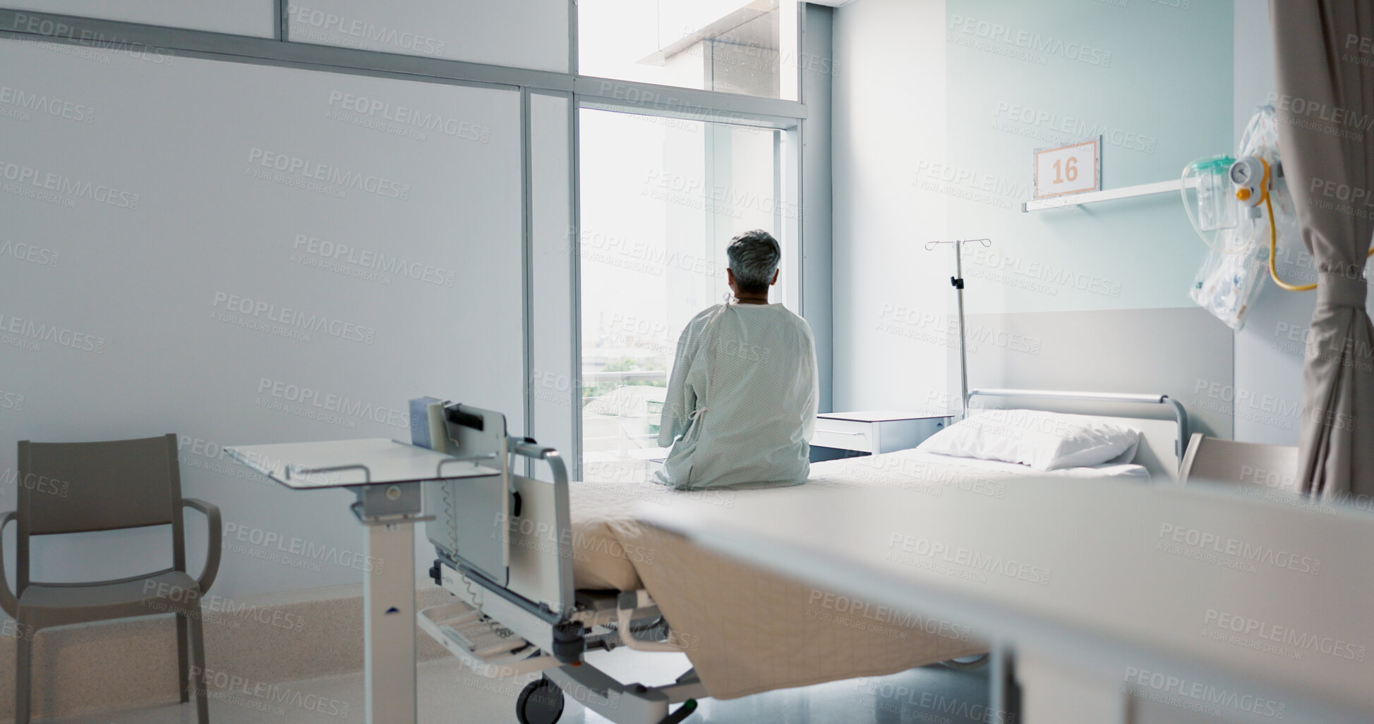 Buy stock photo Back, healthcare and a woman on a hospital bed by the window in recovery or waiting for a visit. Medical, cancer and a patient thinking about the future of medicine in a health clinic for treatment