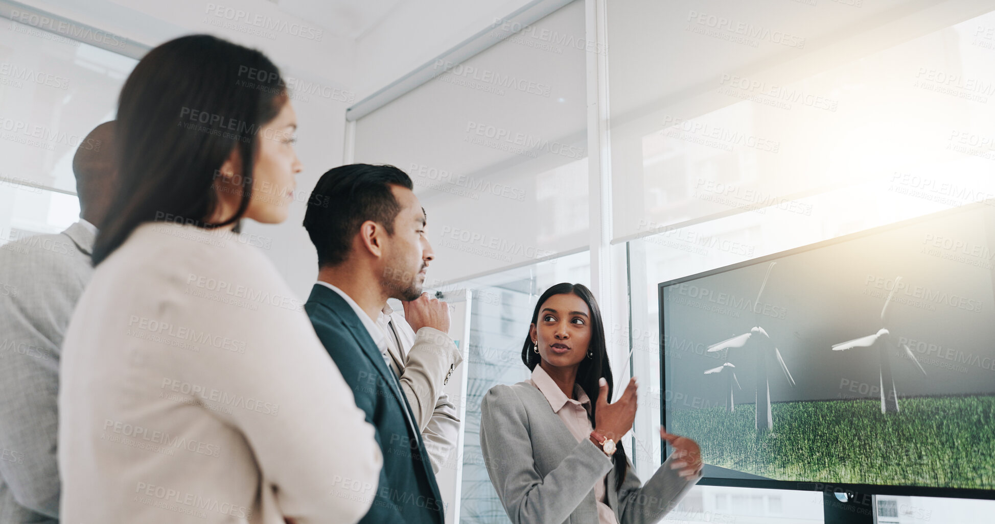 Buy stock photo Presentation, renewable energy and windturbine with business people in meeting for planning, engineering and environment. Technology, research and sustainability with employees in office for workshop