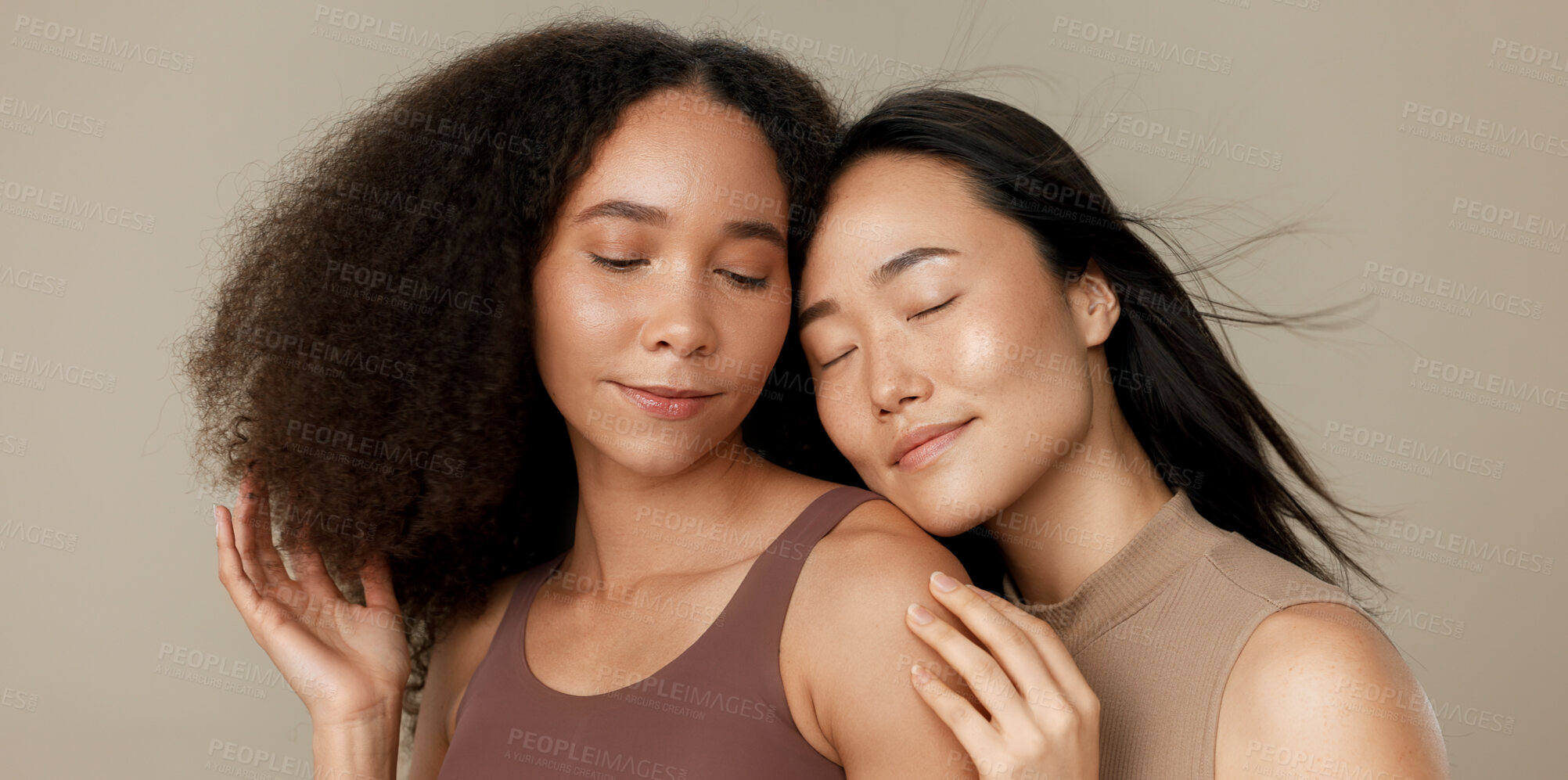 Buy stock photo Beauty, hair and portrait of women friends in studio for diversity, inclusion and wellness. Face of model people on beige background for different facial care, makeup glow or cosmetics and wind