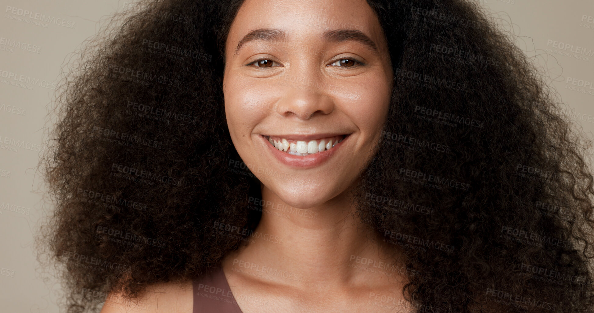 Buy stock photo Beauty, haircare and smile with face of woman in studio for skincare, cosmetics or self care. Happy, hairstyle and natural with portrait of person on brown background for texture, health or wellness