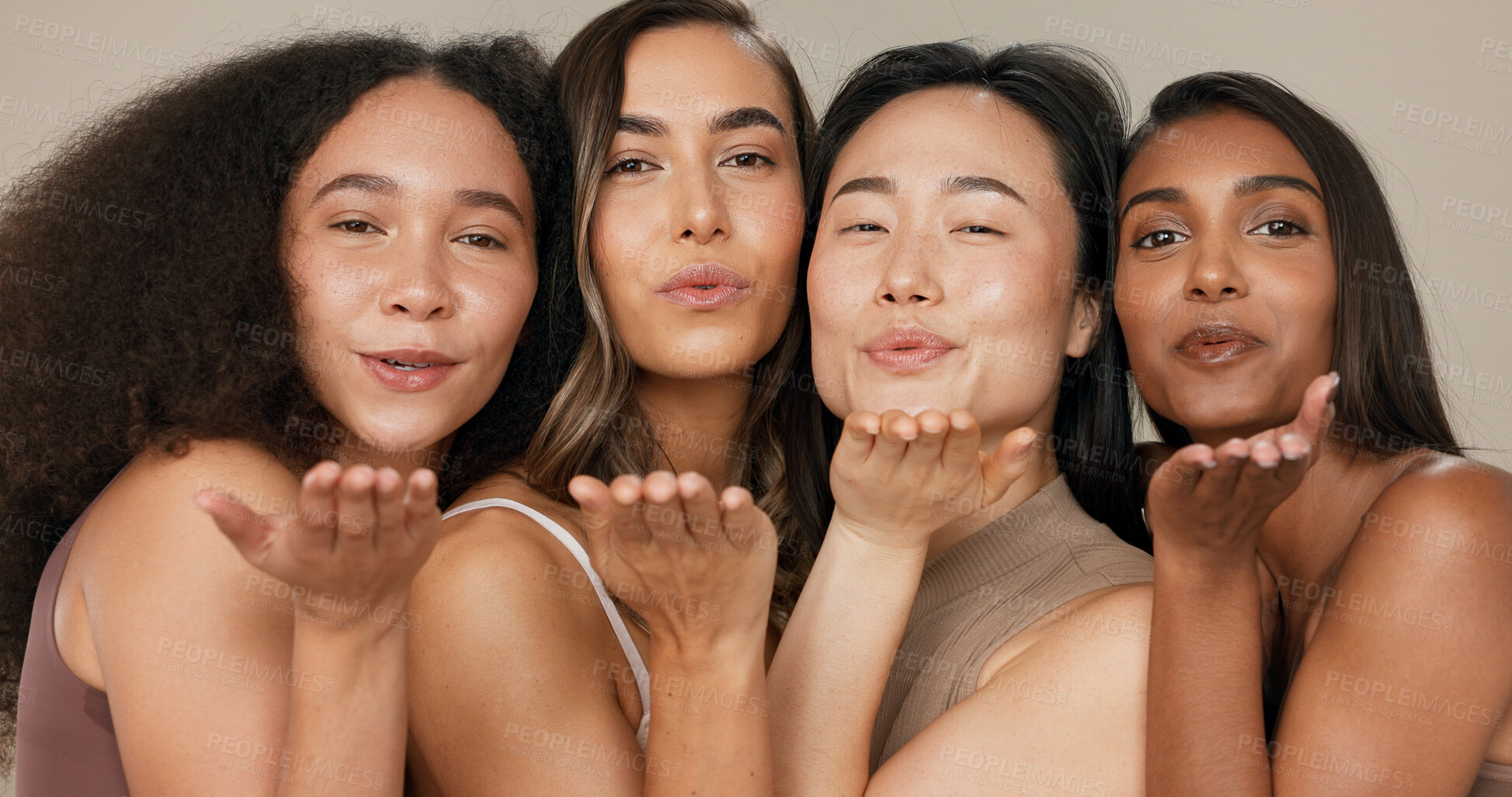 Buy stock photo Beauty, women or friends blow kiss in studio for diversity, inclusion and wellness. Face of happy people on neutral background for different facial care, dermatology glow or makeup and cosmetics