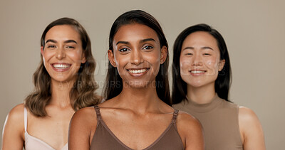 Beauty, diversity or smile of women friends in studio for portrait, inclusion or wellness. Face of happy people on neutral background as different skin care, dermatology glow or cosmetic comparison