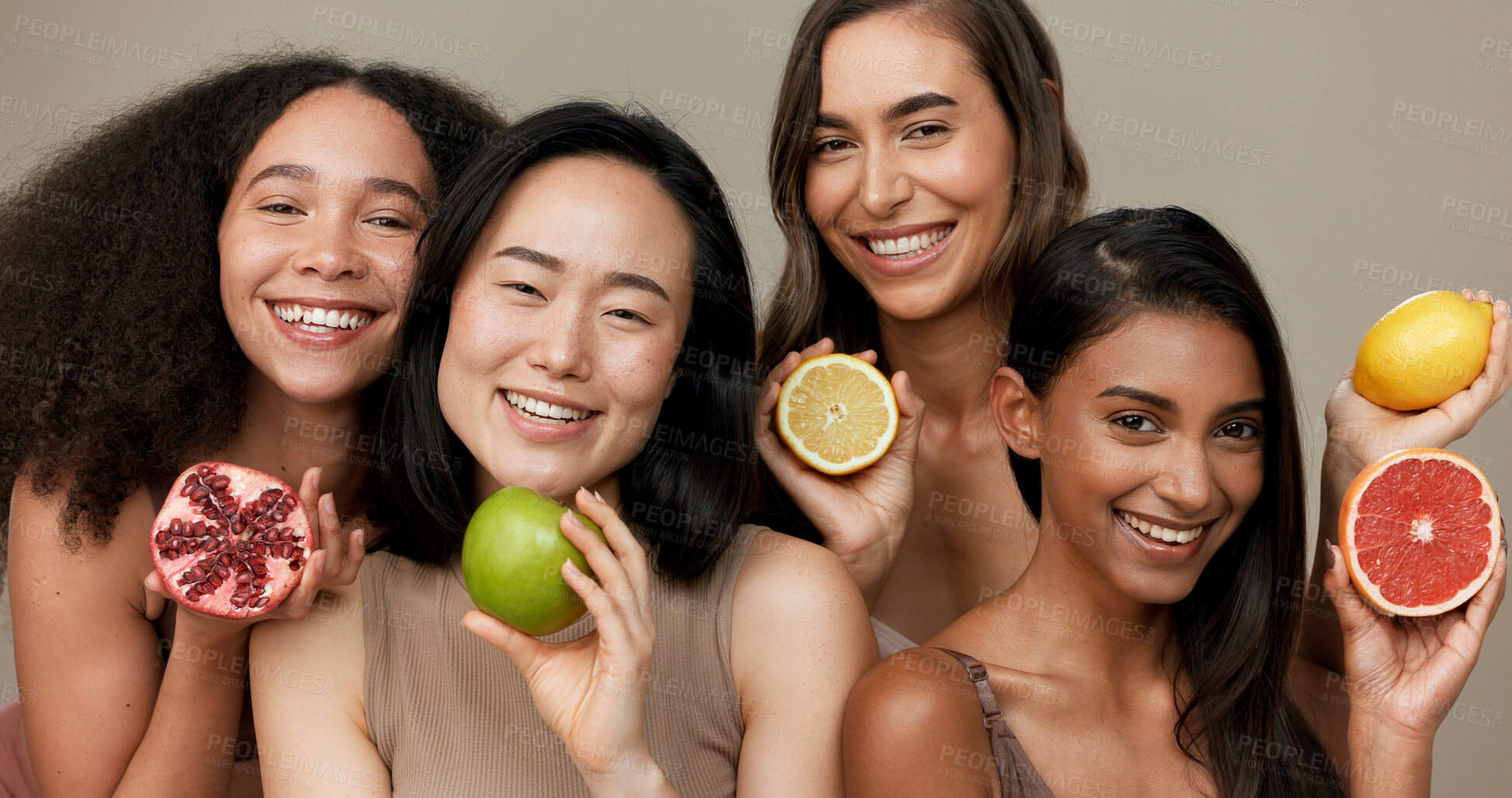 Buy stock photo Women, portrait and beauty, diversity and fruit with dermatology and friends on studio background. Unique skin, natural cosmetics and inclusion, eco friendly skincare, smile and citrus for vitamin c