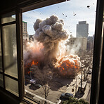 Large explosion viewed from apartment building window.