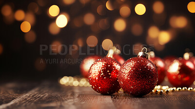 Red noel on table against background. Golden bokeh. Christmas concept.