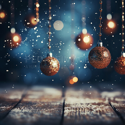 Gold noel hanging over table. Bokeh blue background. Christmas concept.