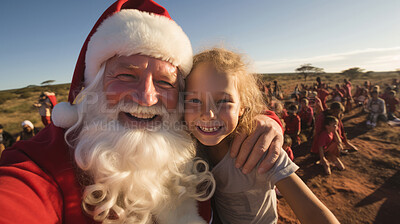 Happy selfie of santa and poor child in rural africa. Spreading love. Christmas concept.