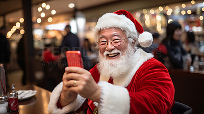 Buy stock photo Happy santa taking a selfie in busy city street. Holiday, festive season.