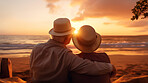 Loving senior couple spending quality time after retirement or on vacation at sunset