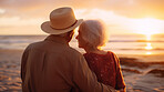 Loving senior couple spending quality time after retirement or on vacation at sunset