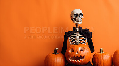 Creepy skeleton render and carved pumpkins for halloween celebration against orange wall
