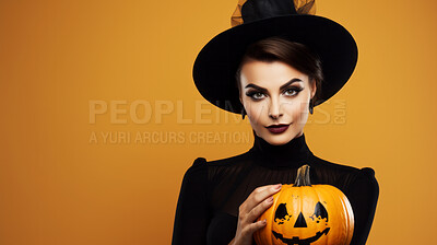 Buy stock photo Attractive woman wearing a witch costume and holding a pumpkin on orange background