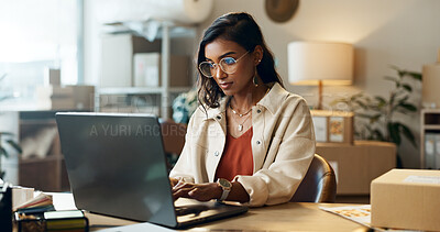 Buy stock photo Ecommerce, woman and typing on laptop in office for research, feedback and supply chain for business. Indian, person or planning on pc for logistics, stock administration or package distribution data