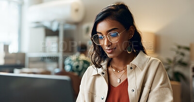 Buy stock photo Ecommerce, woman and typing on laptop at work for research, feedback and supply chain for business. Indian, person and planning on pc for logistics, stock administration or package distribution