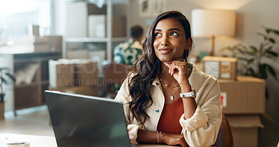 Buy stock photo Ecommerce, woman and thinking with laptop in office for research, feedback and supply chain for business. Indian, person and ideas with pc for logistics, administration or package distribution