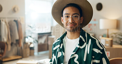 Buy stock photo Happy, fashion and portrait of a man in retail for store management, ecommerce or designer work. Smile, mockup and an Asian employee at a distribution shop for clothes, sale or logistics of stock