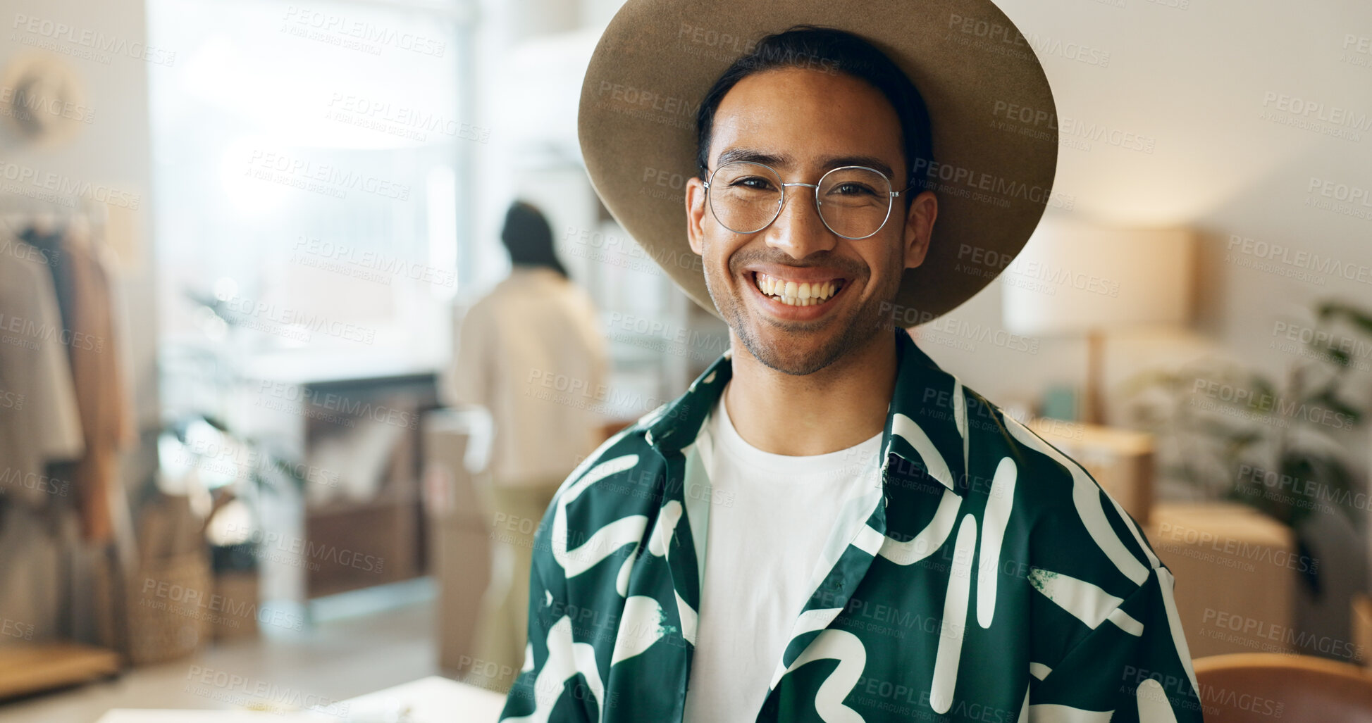 Buy stock photo Creative, ecommerce and portrait of a man in retail for store management, fashion or designer work. Smile, happy and an Asian employee at a distribution shop for clothes, sale or logistics of stock