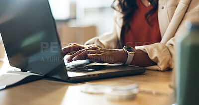 Woman, hands and laptop typing email for communication, networking or research at office. Closeup of female person working on computer for online search, small business or logistics at workplace