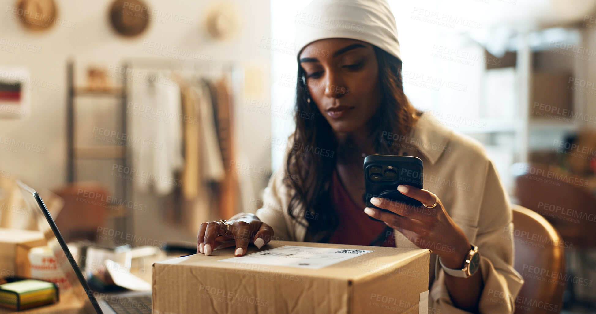 Buy stock photo Woman, box and phone in logistics for inventory or storage inspection at fashion or clothing boutique. Female person or small business owner checking boxes for pricing with mobile smartphone at store