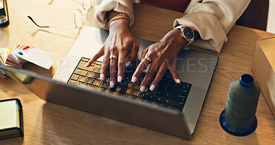 Top view, business and woman with a laptop, fashion and internet with connection, ecommerce and online order. Closeup, hands and entrepreneur with a pc, company website and supply chain with employee
