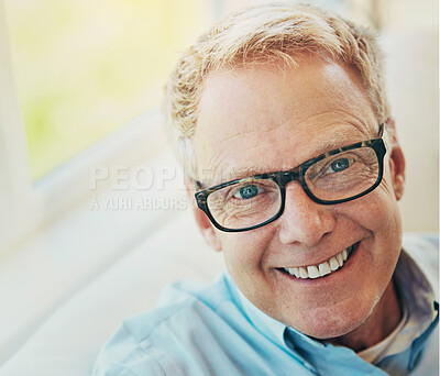 Buy stock photo Portrait, glasses or happy mature man in house living room to relax with care on sofa for resting break. Apartment, face or senior male person with smile or wellness in retirement, lounge or home