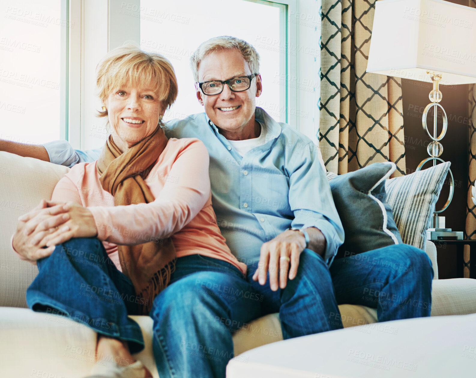 Buy stock photo Relax, happy and portrait of mature couple on sofa for bonding, healthy relationship and marriage. Retirement, home and senior man and woman on couch for love, commitment and happiness in living room