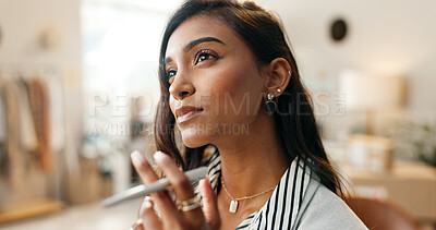 Face, thinking and a designer indian woman in her workshop for logistics or supply chain planning. Idea, retail or ecommerce with a young employee problem solving a delivery strategy for distribution