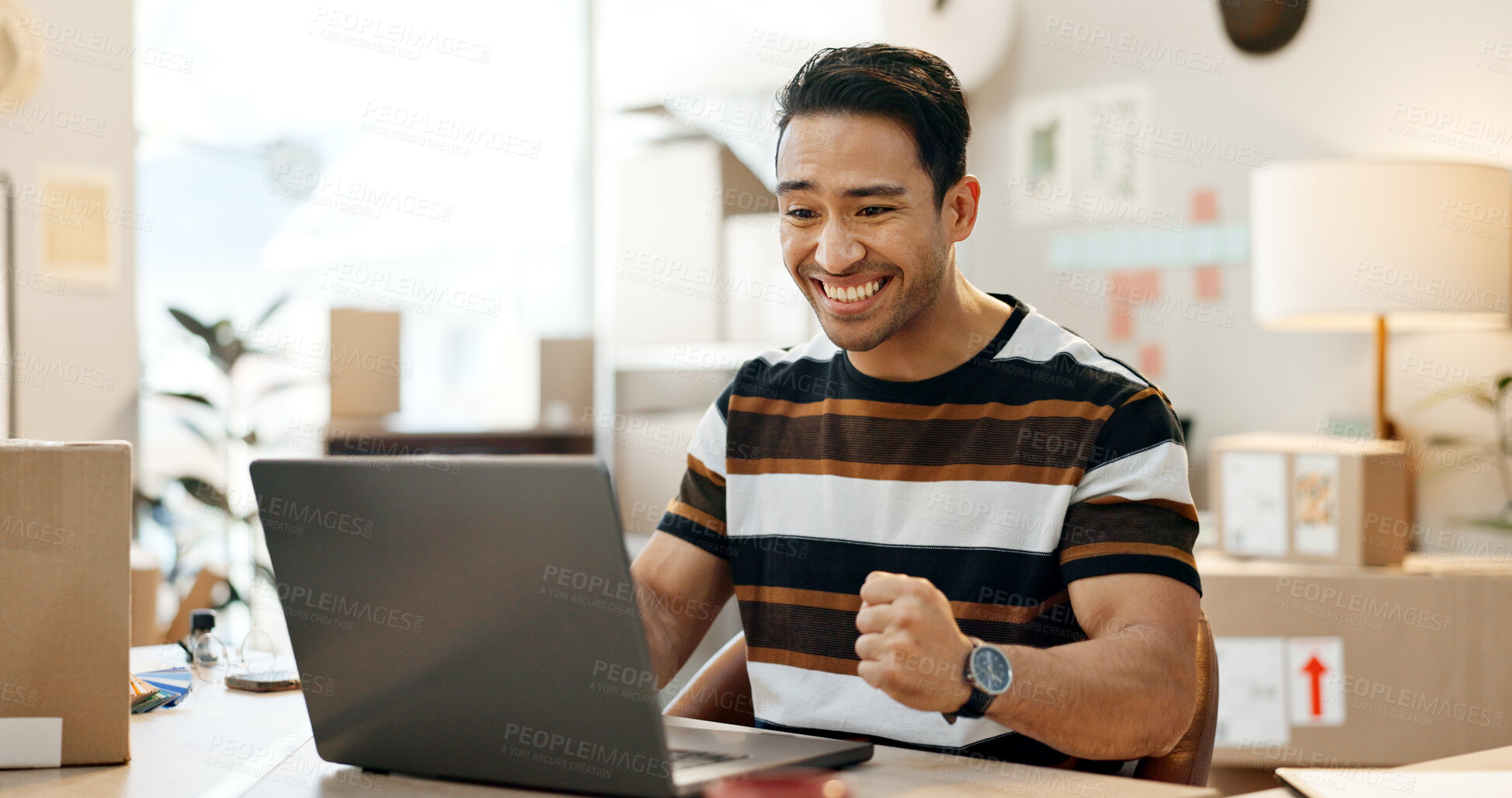 Buy stock photo Business man, boxes and celebration on laptop for startup success, e commerce sales and profit or bonus in office. Entrepreneur, seller or Asian winner reading news of courier and winning on computer