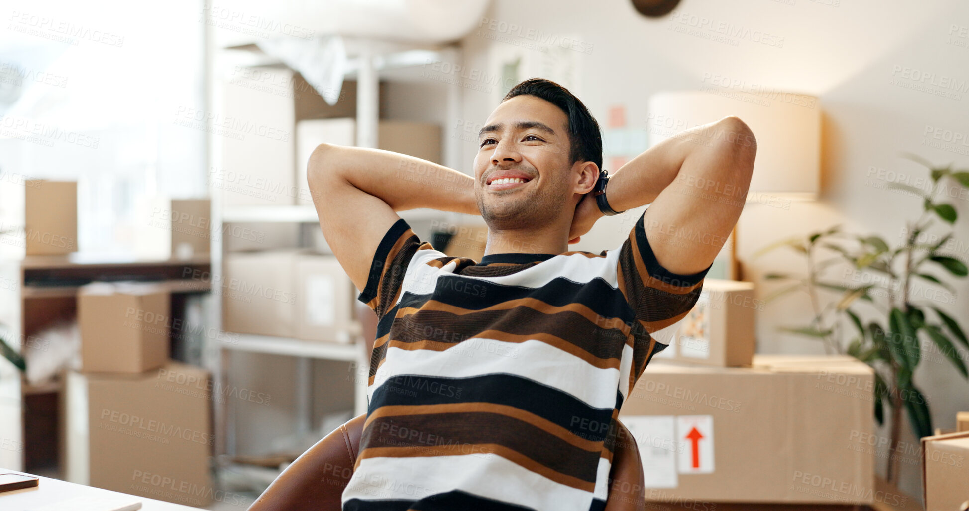 Buy stock photo Happy man, smile and relax in satisfaction in office at logistics, shipping or distribution company. Asian person, entrepreneur or worker with excitement at desk for customer orders, profit or sale