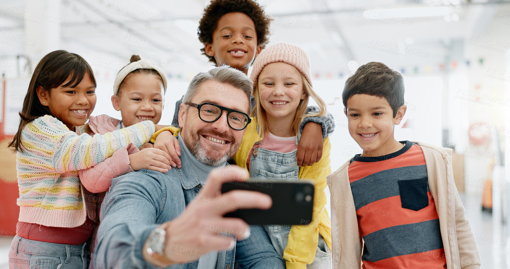 Buy stock photo Selfie, children and teacher with smartphone, happy and smile for picture, excited and teacher. Kids, internet and cellphone for technology, online and memories for school, classroom and diversity