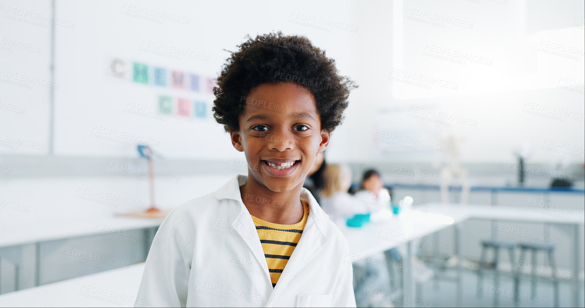 Buy stock photo Portrait, science and child in classroom with lab coat, knowledge or learning about chemistry with smile. Face, student or boy with happiness in laboratory, workshop or academy for education or study