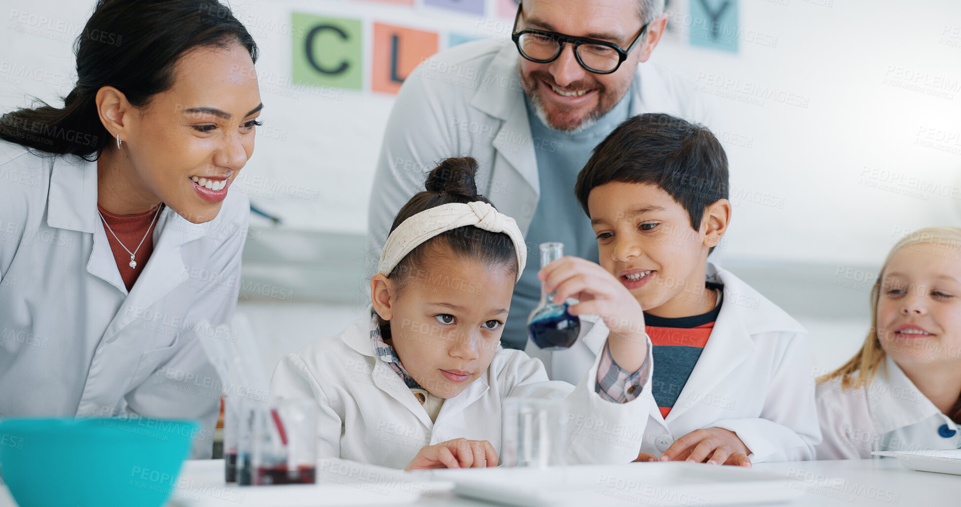 Buy stock photo Science, school and students in class with their teachers for learning or to study chemistry. Children, education and scholarship with kids in a laboratory for an experiment of chemical reaction