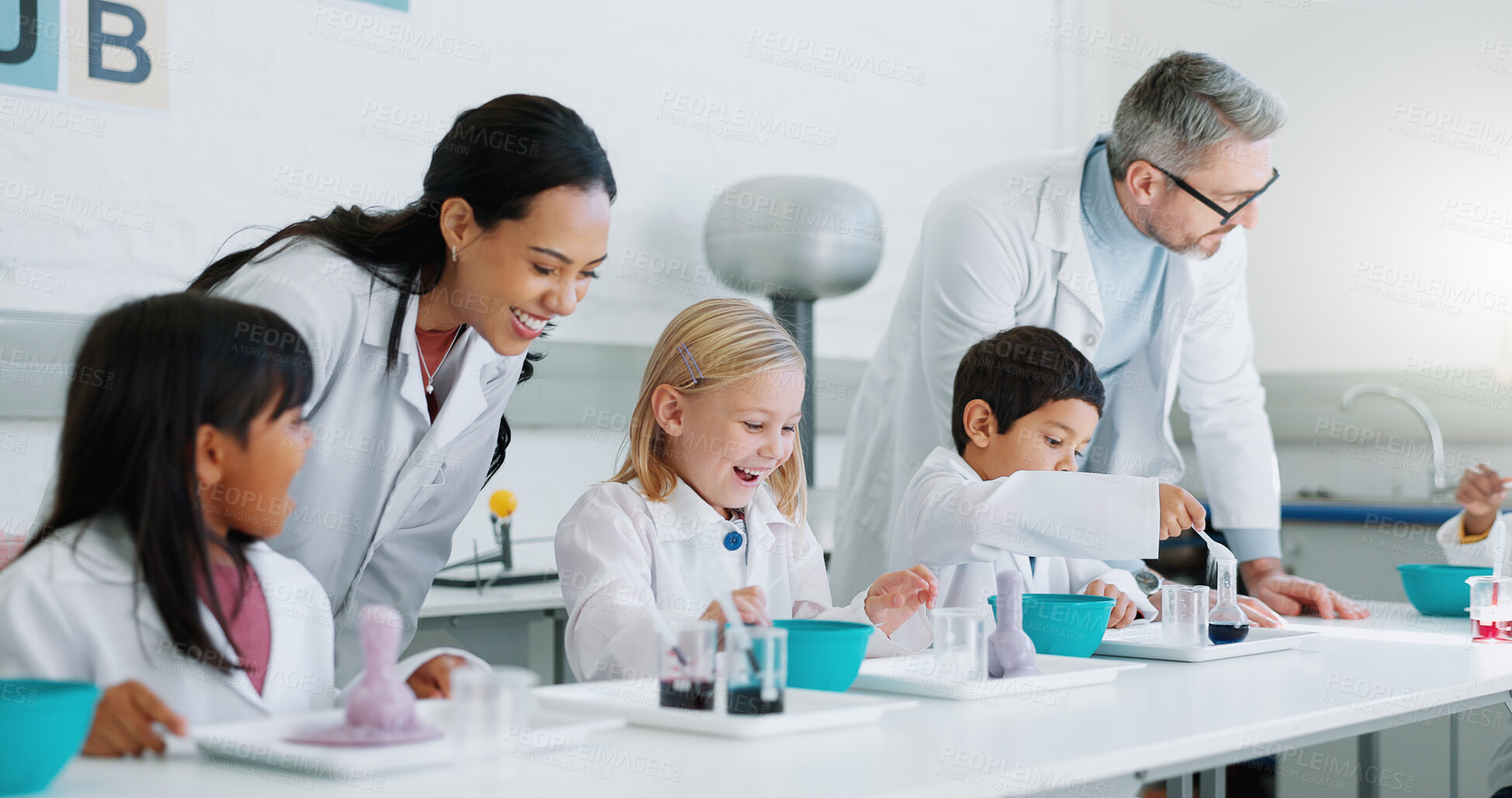 Buy stock photo Science, education and students in class with their teachers for learning or to study chemistry. Children, school and scholarship with kids in a laboratory for an experiment of chemical reaction