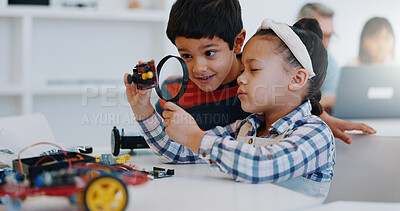 Children, magnifying glass and classroom for learning, education and robotics for technology, science and school. Childhood, students or innovation with kids, studying or inspection project research