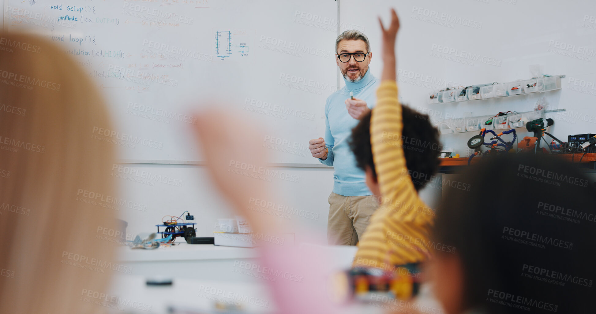 Buy stock photo Science, raised hand and teacher with child in classroom for research on a project in school. Knowledge, education and man educator or tutor helping kid student on digital technology for chemistry.