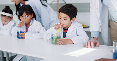 Study, science and kids in class for an experiment while learning chemistry together at school. Education, laboratory and innovation with student children in a classroom for growth or development