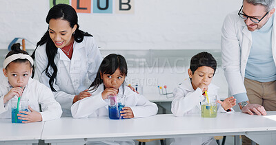 Education, science and kids in class for an experiment while learning chemistry together at school. Study, laboratory and innovation with student children in a classroom for growth or development