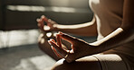 Meditation, hands woman in lotus pose on a floor for peace, zen or mental health wellness at home. Breathing, relax and female person in living room for energy training, exercise or holistic practice