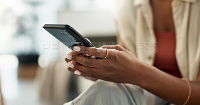 Woman, hands and typing on smartphone in home, reading social network notification and update multimedia subscription. Closeup, app and download mobile games, scroll on internet and chat to contact