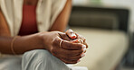 Woman, hands and closeup on psychology sofa mental health anxiety, support or empathy consultation. Indian female person, fingers and professional stress advice or trust therapy, thinking or sad help