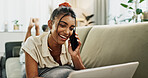 Phone call, happy and woman with a laptop on a sofa for relaxing in the living room of apartment. Smile, communication and Indian person on mobile conversation with cellphone in lounge of modern home