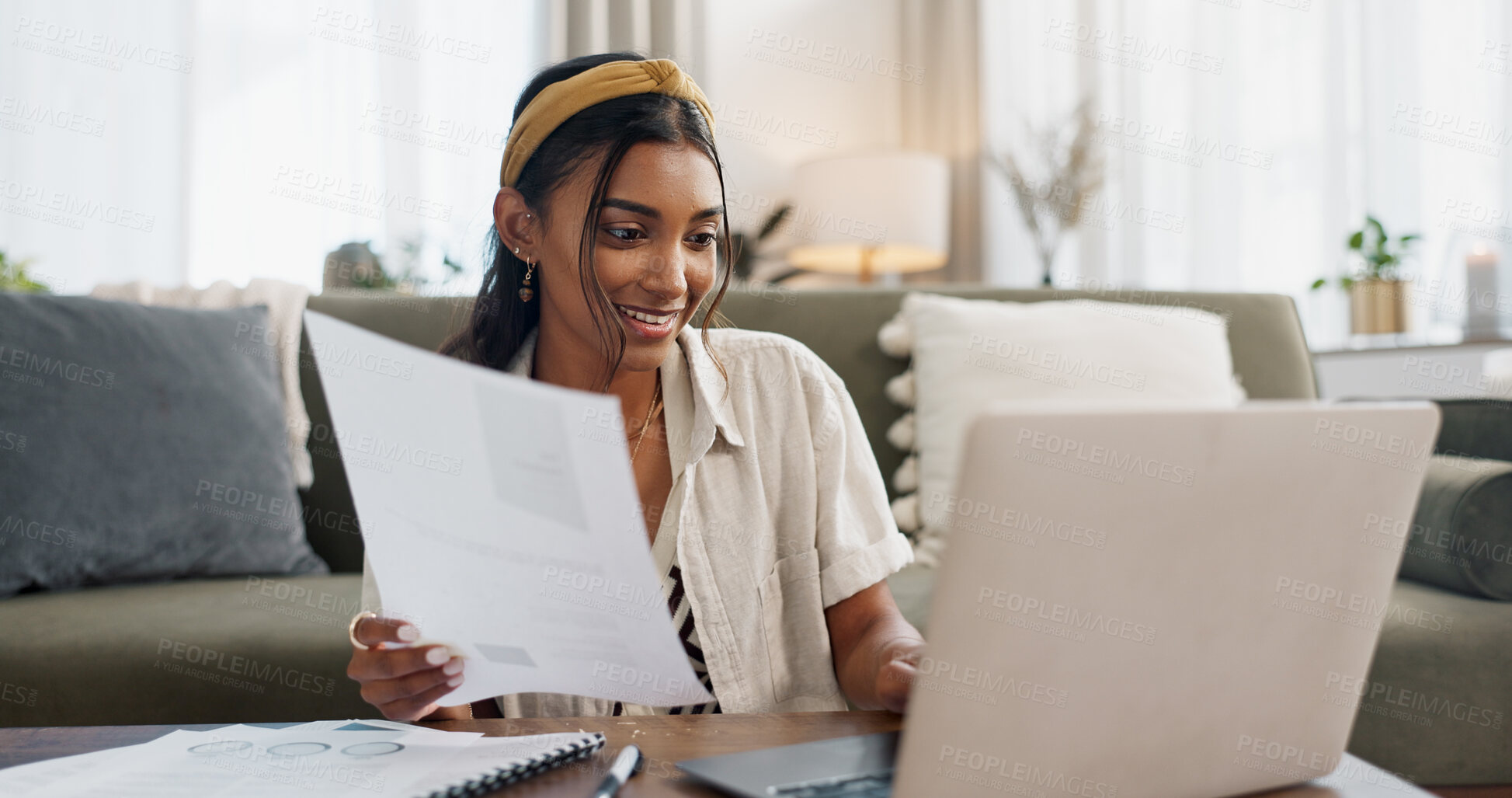 Buy stock photo Woman, work from home and documents on laptop for online research, financial planning and data report. Young worker or freelancer typing on her computer with paperwork, bills and taxes in living room