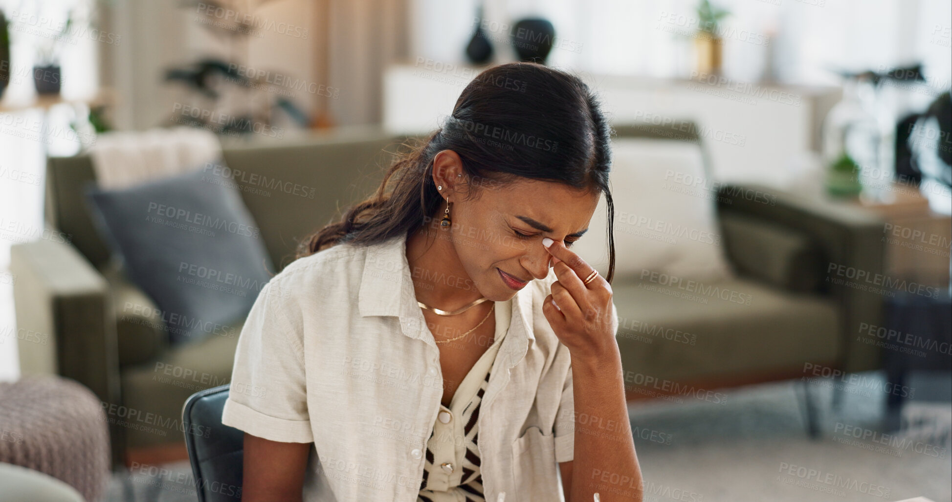 Buy stock photo Woman, pain and headache in living room for stress, mental health or anxiety of fatigue, frustrated crisis or depression. Tired indian girl with eye strain from burnout, vertigo and brain fog at home